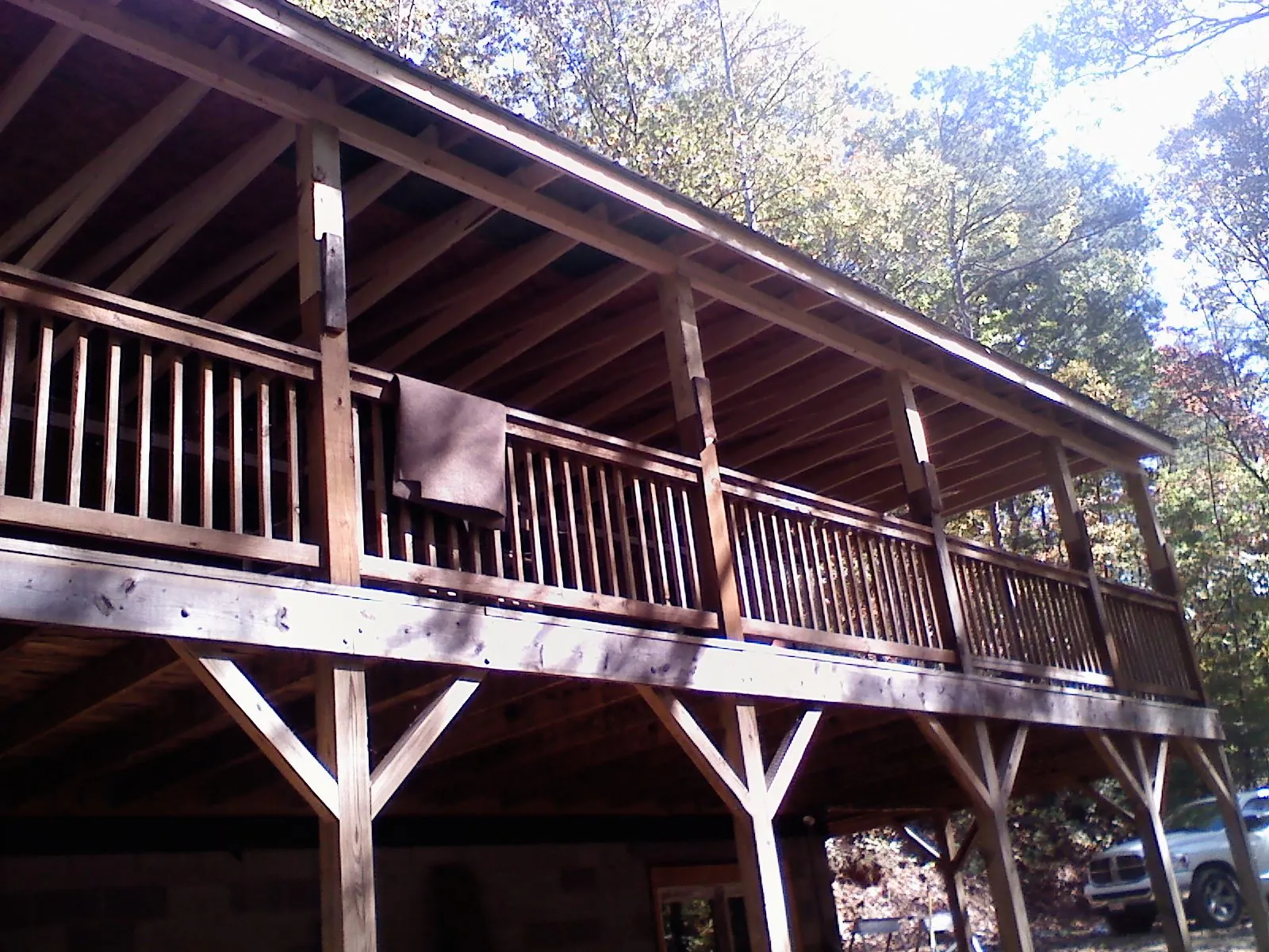 Timber framing under a new elevated porch and deck — Roof Leak Repair in Grove by Roofing Brothers